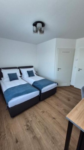 Apartments Seibel Doppel-Zweibettzimmer mit Bad